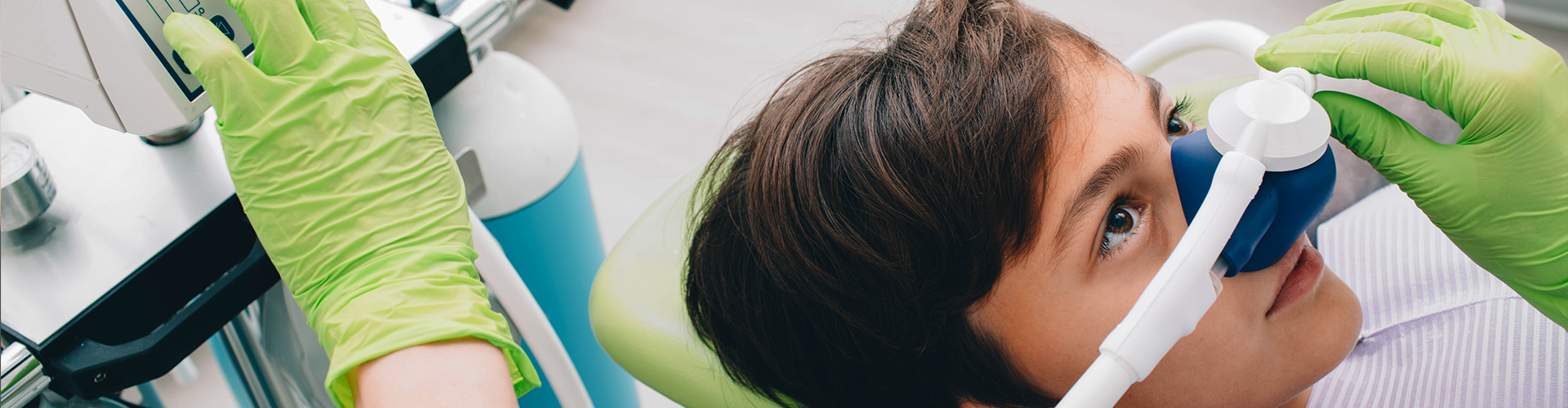 breathing mask over boy's nose.